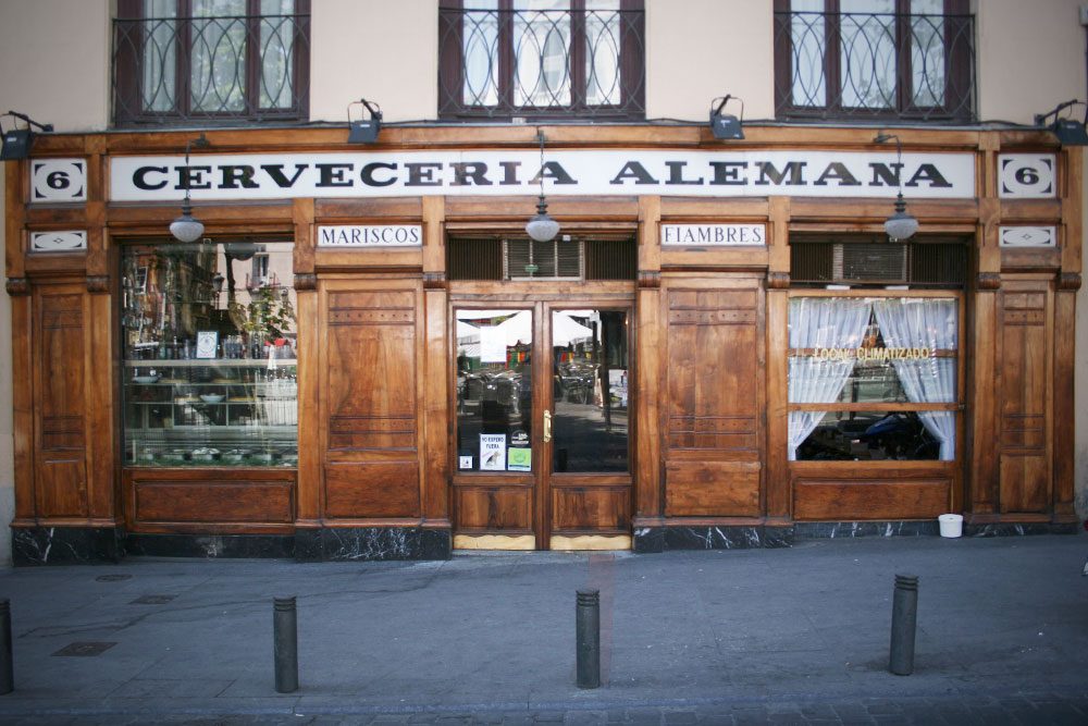 Cervecería Alemana's marble-topped tables on Plaza de Santa Ana